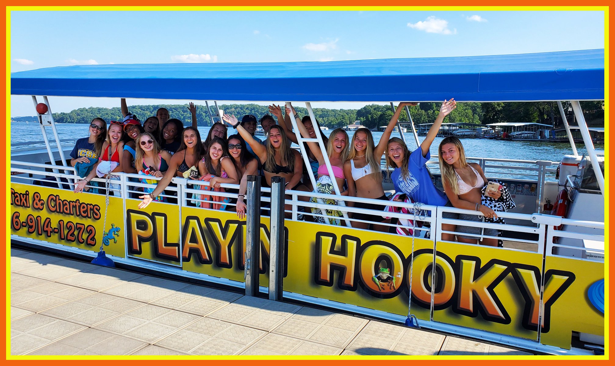 A group of young women aboard a Playin Hooky boat, enjoying a Lake of the Ozarks cruise.